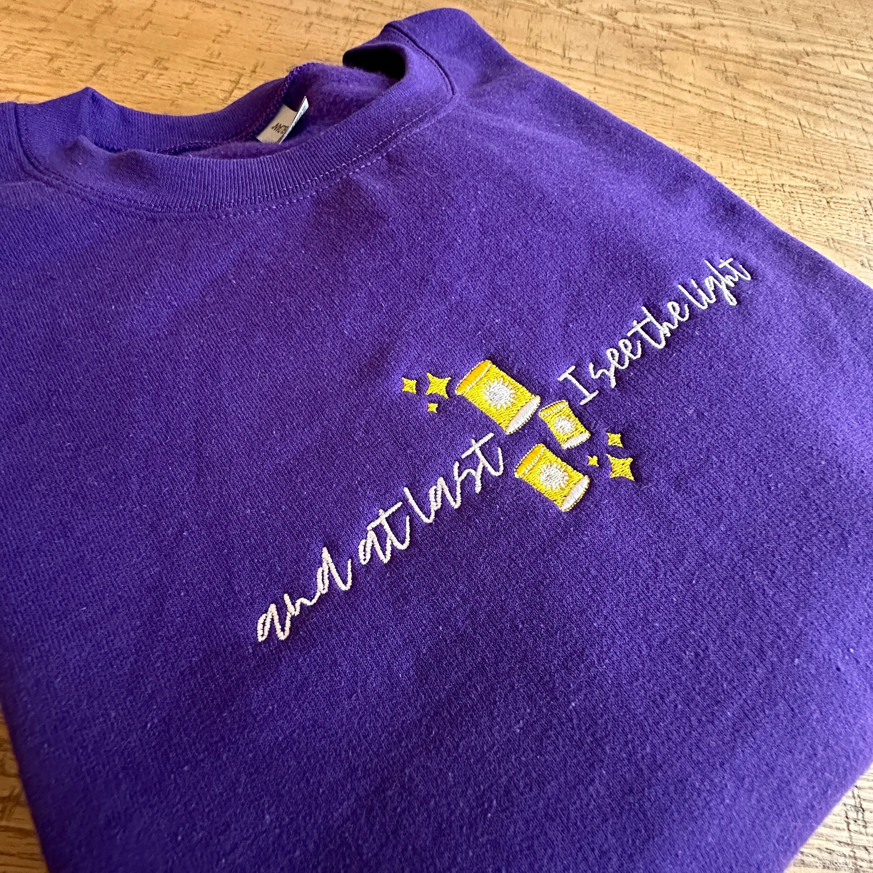 And At Last I See The Light on Princess Purple Gildan Heavy Blend Sweatshirt