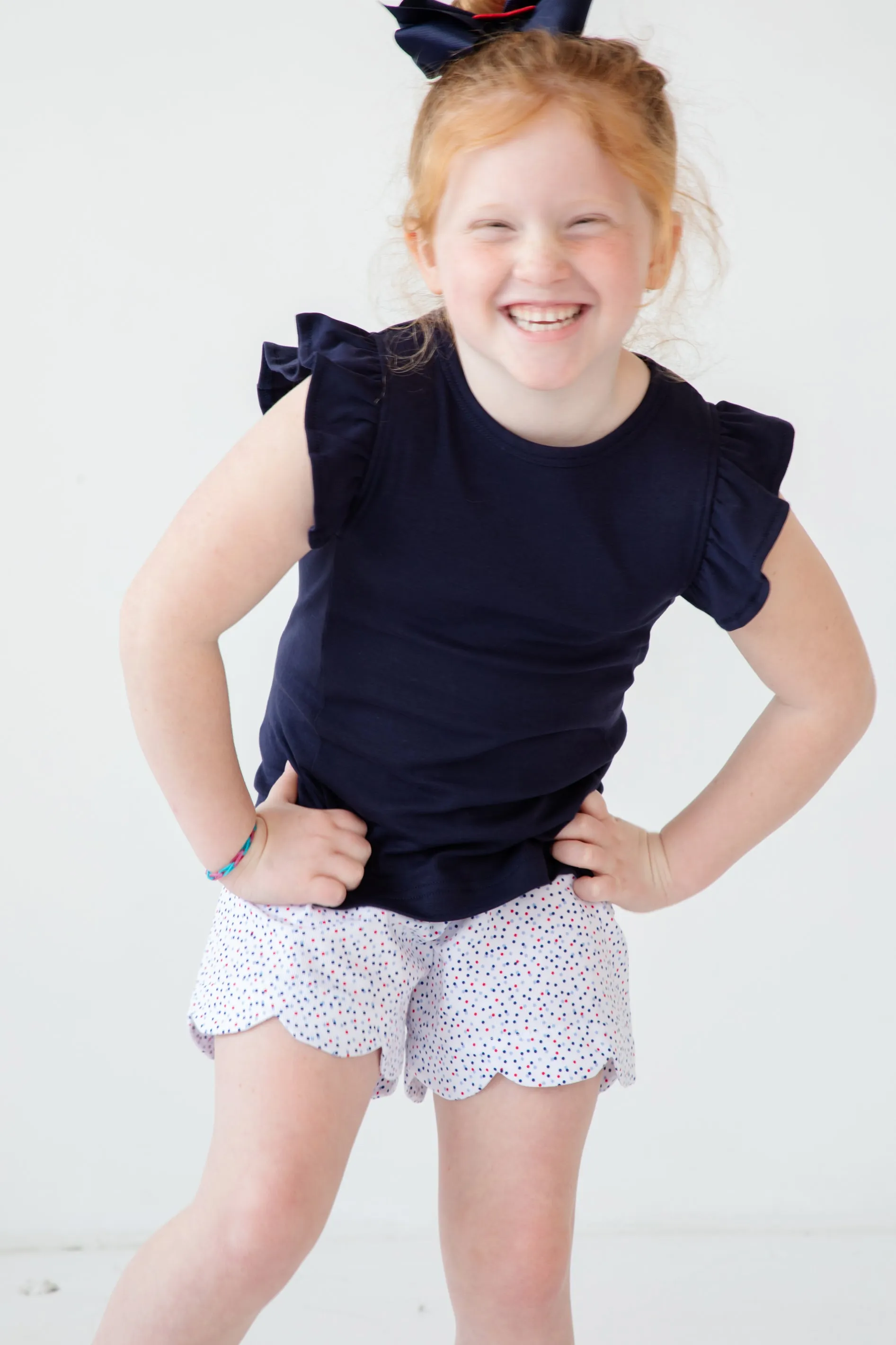 Navy Ruffle Knit Top