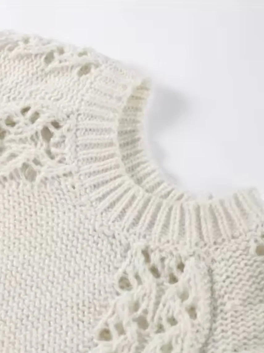 White sleeveless sweater pullover