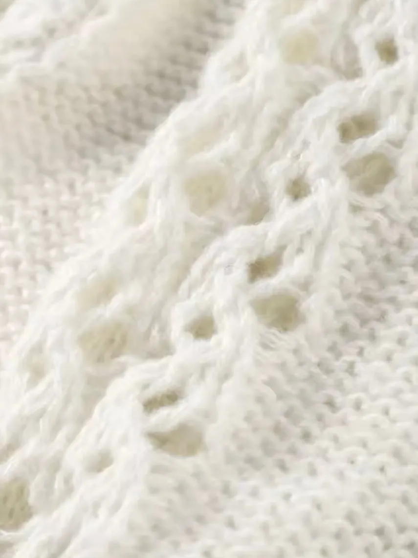 White sleeveless sweater pullover