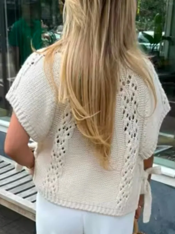 White sleeveless sweater pullover